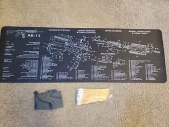 Weapon cleaning mat with cotton swabs and cleaning cloth