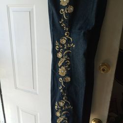 Denim gene New. Never worn, Size 18 Tall With gold Embroidery and Rhinestone on Them Stretch material Absolutely beautiful To Tight for me.
