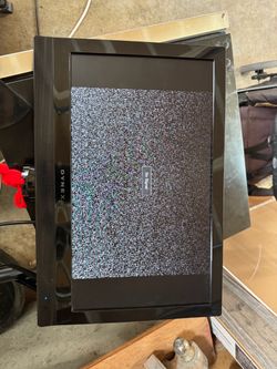 19” Dynex Tv w/Remote on arm mount
