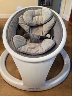 Munchkin Swing with remote and Bluetooth enabled