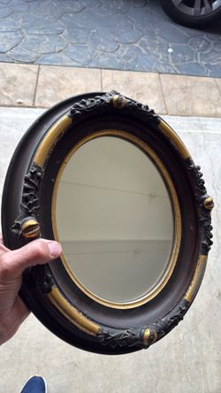 Mirror, 1800s, 19 high by 12 wide oval shape shaped