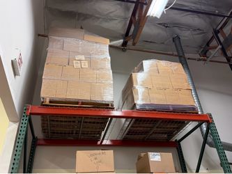 Cases of unopened amber bottles