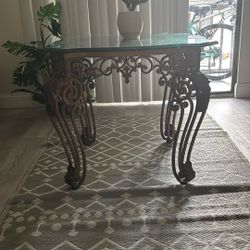 Elegant Glass Dining Table with Wrought Iron Base