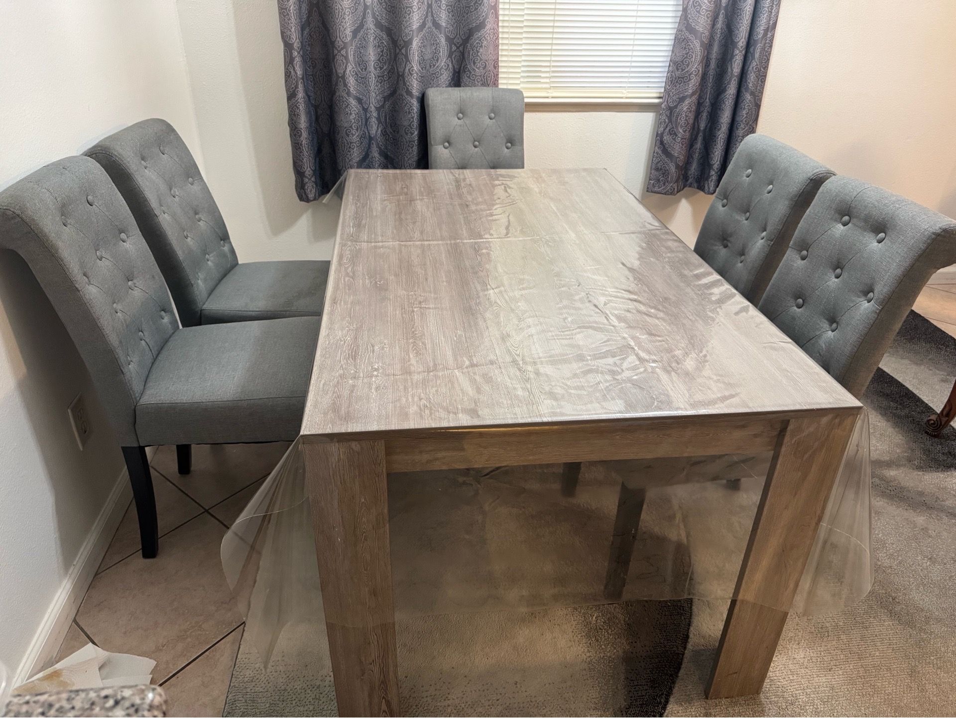 Dining table with chairs.