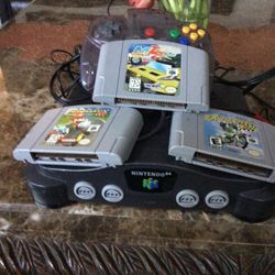 Nintendo 64 works really good one controller three games