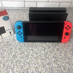 Nintendo Switch 32 gb with docking station no offers or trades please!!