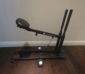 The DB Squat Machine