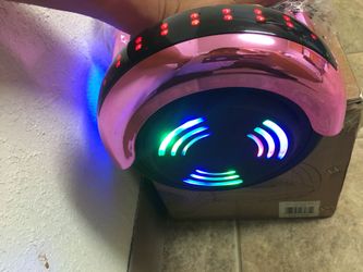 Brand new pink metallic hoverboard (has Bluetooth to play music)