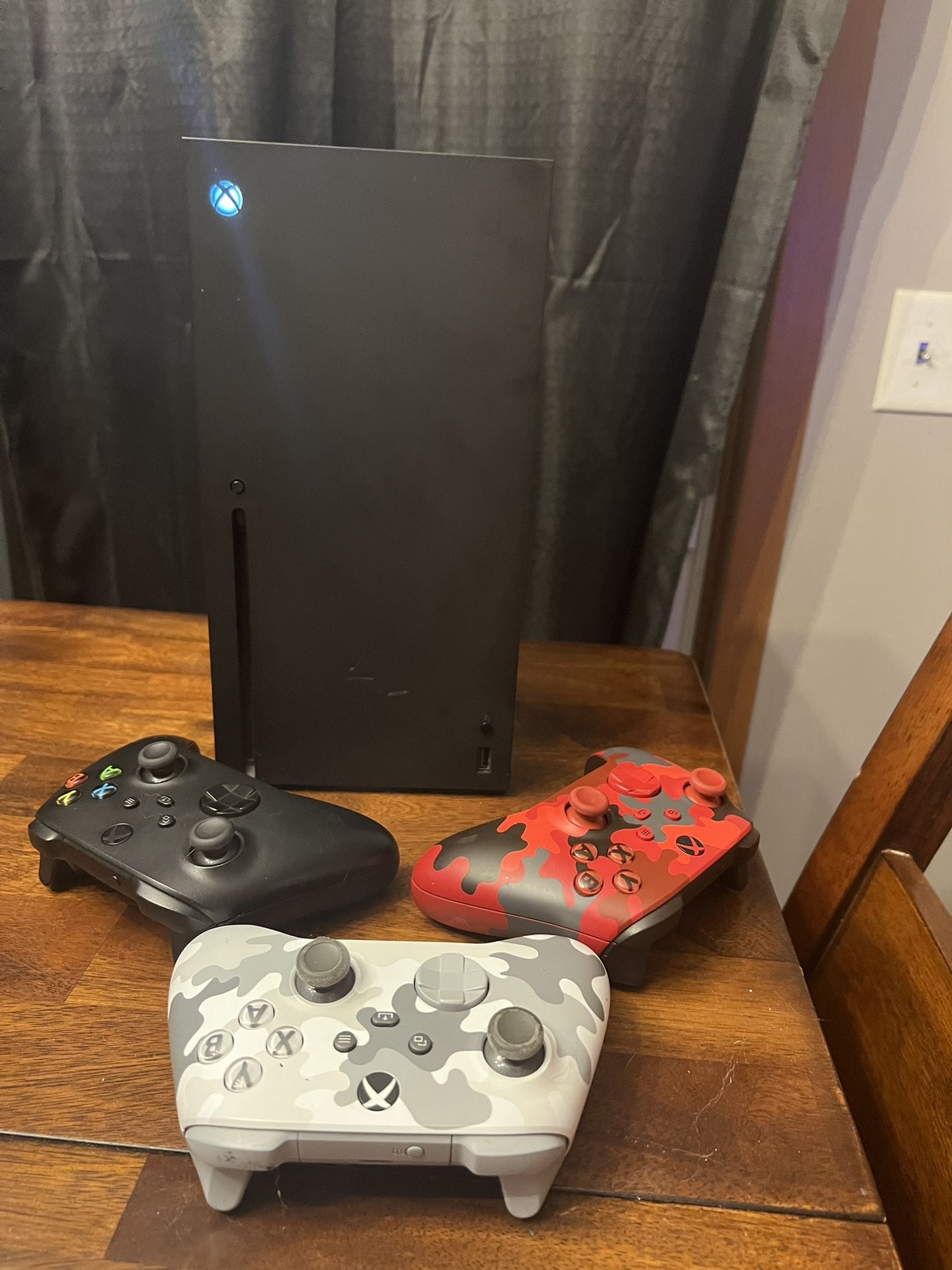 Xbox series X with 3 controllers