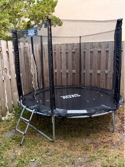 SKOK 8FT Trampoline w/ Safety Net & Ladder – Good Condition