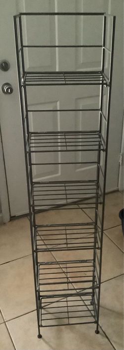 Metal media shelf