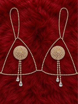 ✨ Luxury Rhinestone Body Tassel Set – $49 ✨  Add beautiful sparkle to your outfit with this stunning gold-tone rhinestone tassel set. Designed to cove