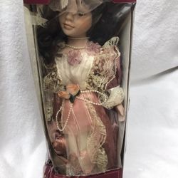 Vintage porcelain doll still in box never opened only $10