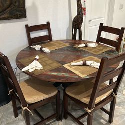Nadeau Dinning Room 4 Chairs And Round Table