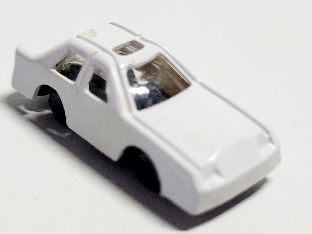 Unbranded Micro Mini 1.5" Pocket White Sedan Car Plastic Lightweight Portable Miniature. The Unbranded Micro Mini 1.5" Pocket White Sedan Car is a lig