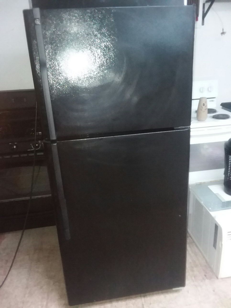 Black GE refrigerator