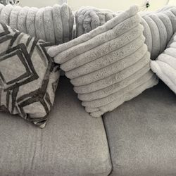 Sofá modular gris de 3 piezas $950