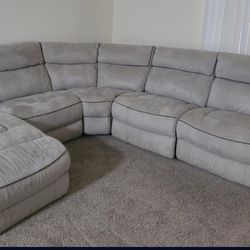 Light Grey Reclining Sectional With Chase And Outlets