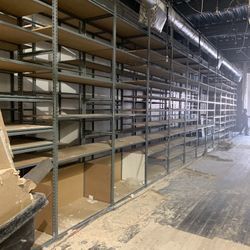 Shelving. Two rows 150ft long 12’high