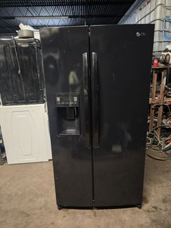 general electric double door black refrigerator.