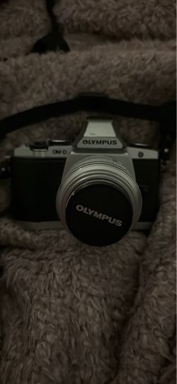 Olympus OM-D Mirrorless Camera with Lens