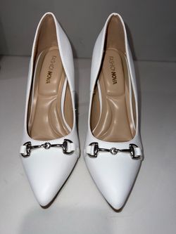 Stunning white heels with silver details