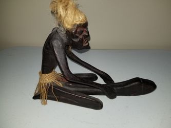 African fertility sculpture with an elongated phallus