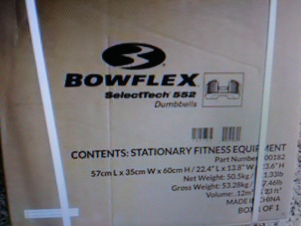 New never assembled Bowflex stand and new never opened select tech 552 dumbbells!