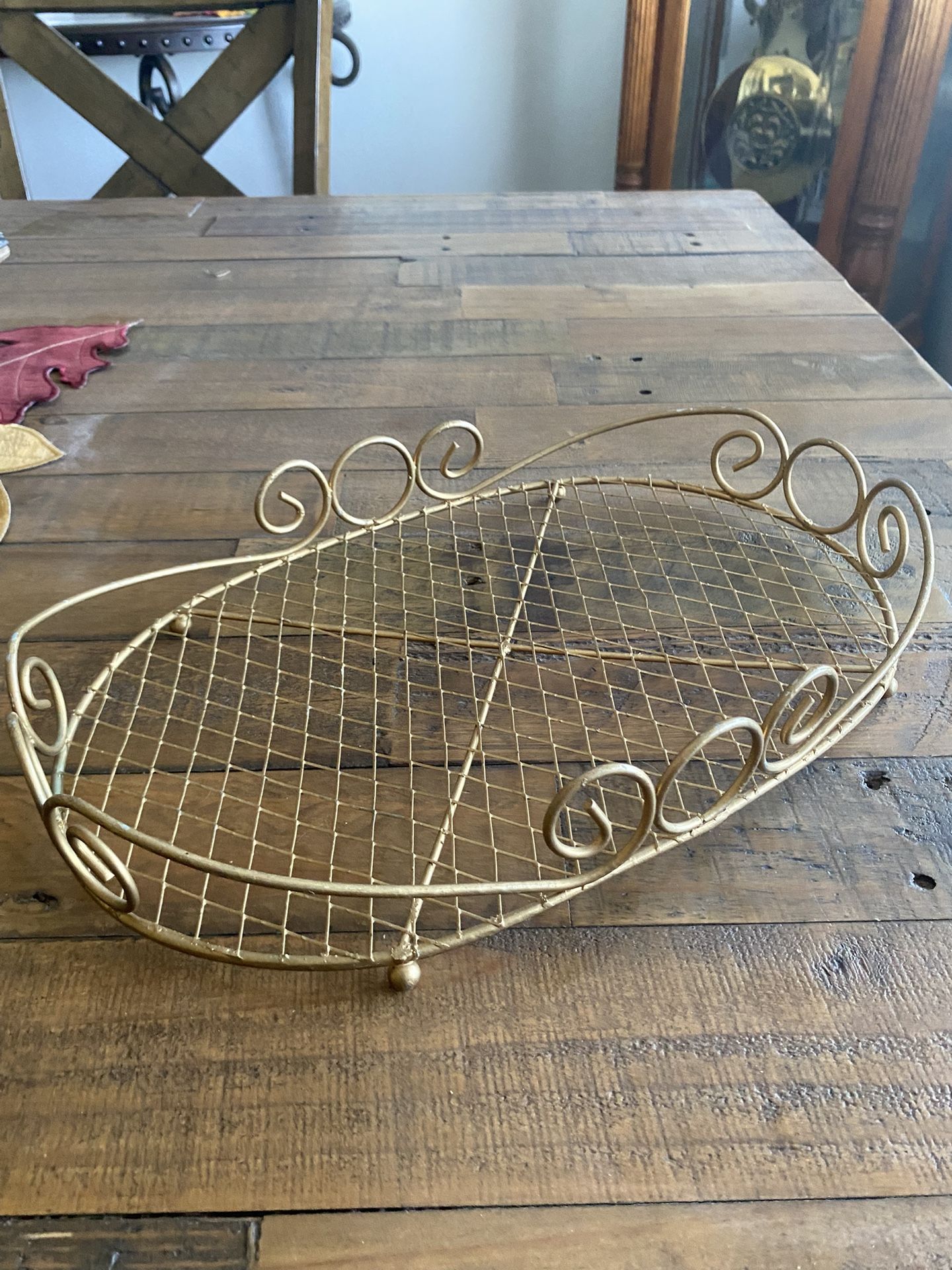 vintage gold-colored metal wire basket