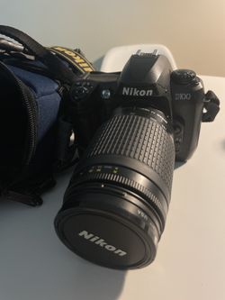 Nikon Camera And Lens