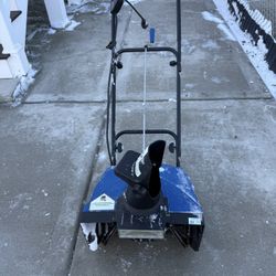 ELECTRIC SNOW BLOWER WITH LIGHT. EXCELLENT CONDITION.$60.00  OR BEST OFFER.