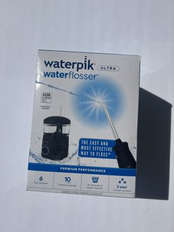 NEW! Never Opened. Waterpik - Ultra Water Flosser - Black/Clear