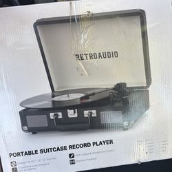RetroAudio Portable Suitcase Record Player, model JM-101.