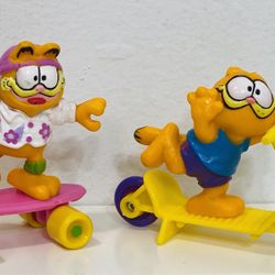 4 VNTG McDonald’s 1988 Garfield W/Scooter (#1),Garfield W/Skateboard (#4) -LOOSE