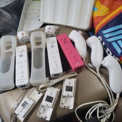 Nintendo wii controller lot
3 controllers
Motion adapters
3 nunchucks
Covers
Rechargeable batteries
