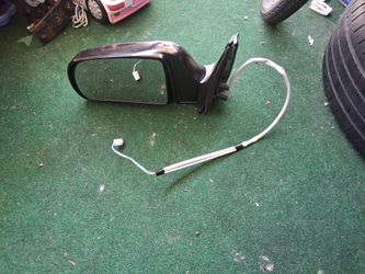 Espejo derecho electrico para una toyota sienna.