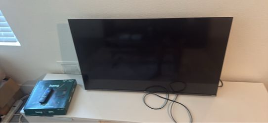 43” Hisense Roku Smart TV + Full-Motion Wall Mount — $100