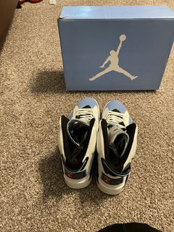 BRAND NEW Carolina blue Jordans