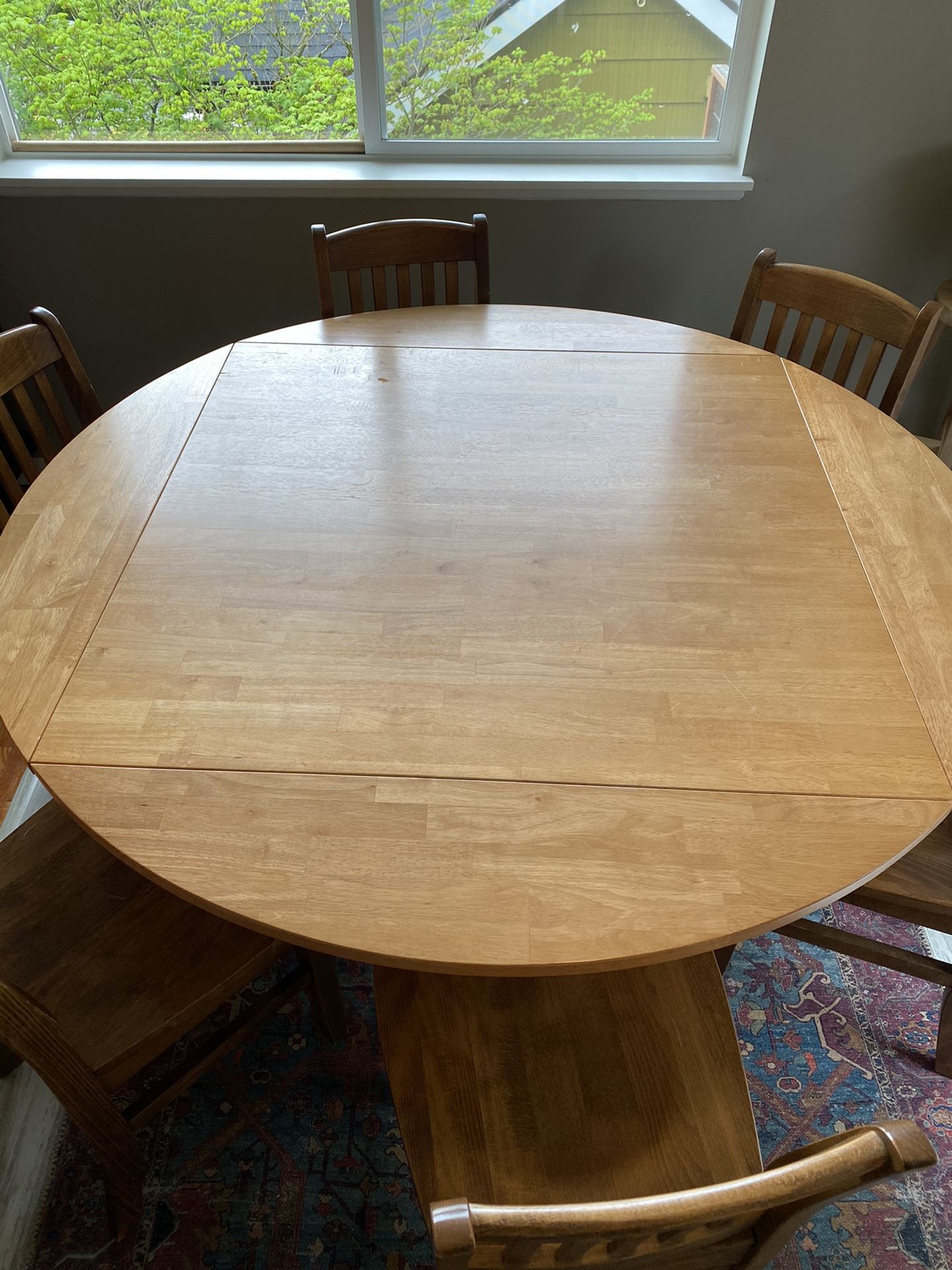 Square to round convertible dining table