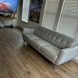 Gray Leather sofa Cushions are permanent