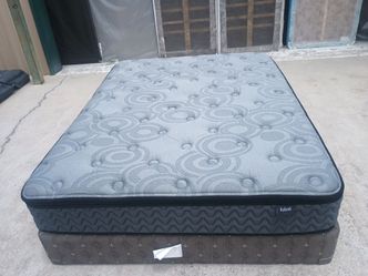 Ashley queen pillowtop hybrid mattress and box spring