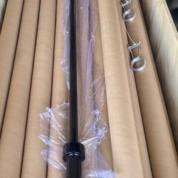 New black seven footer Olympic bar weight 45 pounds. It comes with clamps already.