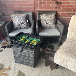 To wicker chairs and ottoman