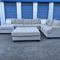 Beige sectional with oversized ottoman DELIVERY AVAILABLE!*