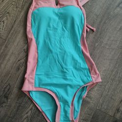 New Beautiful Girls Bathing Suit Size 13 Y.O to 14 Y.O. 👍 See https://offerup.co/faYXKzQFnY?$deeplink_path=/redirect/ & Pickup Only. Great Price 