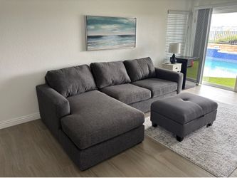 L shaped couch and ottoman
