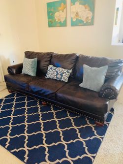 Sofa and love seat set. Brown leather