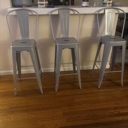 Bar Stool Chairs And Artificial Christmas Tree 