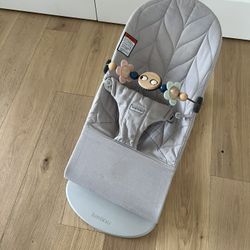 BabyBjorn bouncer (retail $210) + pastel googly eye toy (retail $60)