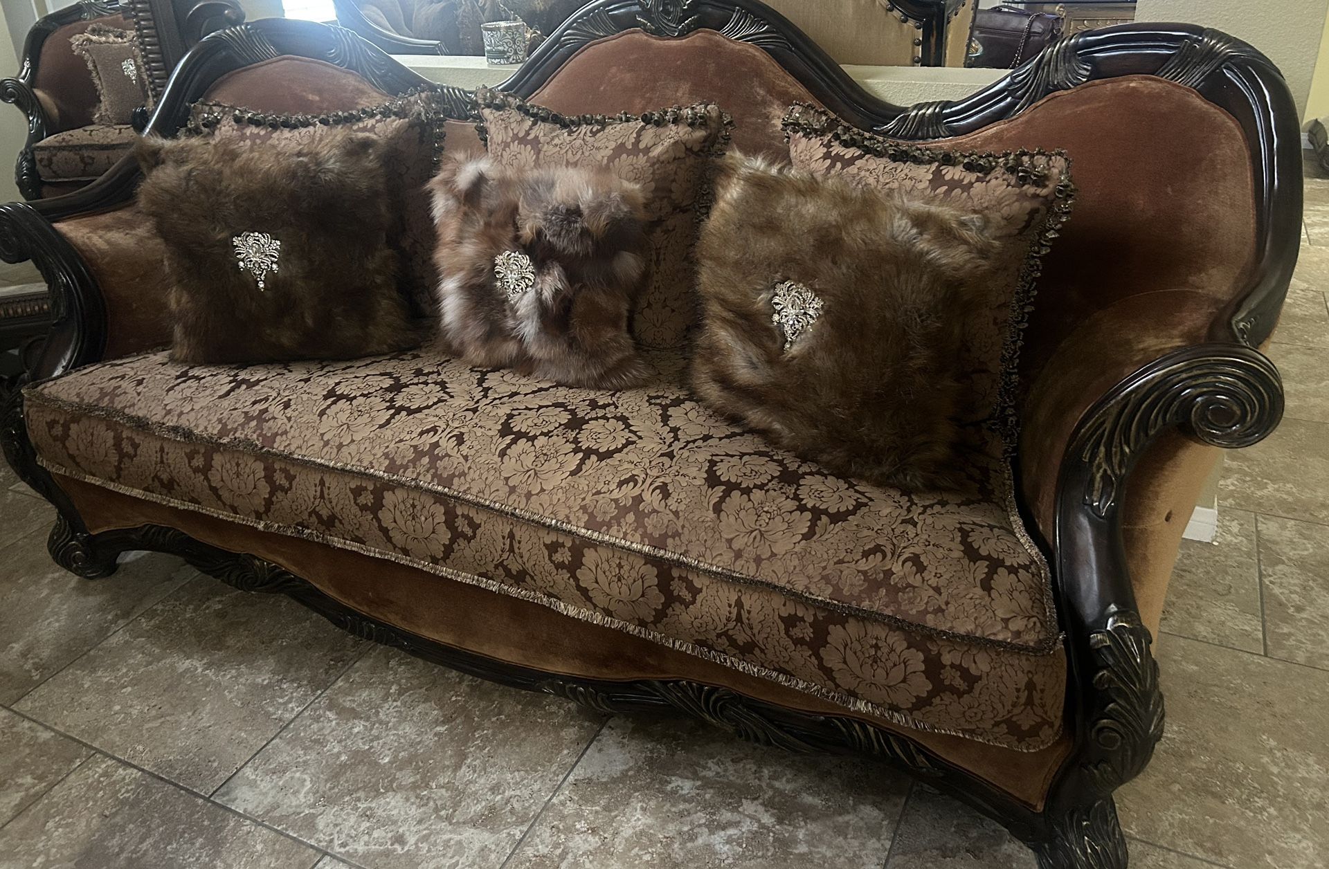 Sofa and matching chair with decorative Pillows!